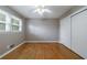 Comfortable bedroom with hardwood floors, closet, and ample natural light at 3909 Ebenezer Rd, Marietta, GA 30066