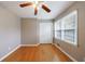 Inviting bedroom featuring hardwood floors, closet, and natural light at 3909 Ebenezer Rd, Marietta, GA 30066