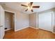 Comfortable bedroom with hardwood floors and a spacious closet at 3909 Ebenezer Rd, Marietta, GA 30066