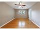 Bedroom with hardwood floors, neutral paint, and ceiling fan at 3909 Ebenezer Rd, Marietta, GA 30066