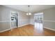 Light filled dining room displaying hardwood floors and easy access to other areas at 3909 Ebenezer Rd, Marietta, GA 30066