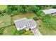 Well-kept home with a two-car garage, a manicured lawn, and mature trees at 3909 Ebenezer Rd, Marietta, GA 30066