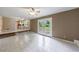 Living area with tiled flooring, open to kitchen, and french doors leading to the backyard at 3909 Ebenezer Rd, Marietta, GA 30066