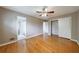 Main bedroom with bathroom, closet, and gleaming hardwoods at 3909 Ebenezer Rd, Marietta, GA 30066