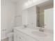 Bathroom featuring double sink vanity and large mirror at 488 Village Ln, Fairburn, GA 30213