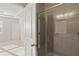 Bathroom with glass enclosed shower, and double sink vanity at 488 Village Ln, Fairburn, GA 30213