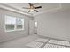 Bedroom with large window and neutral walls at 488 Village Ln, Fairburn, GA 30213