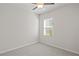 Bedroom with a window at 488 Village Ln, Fairburn, GA 30213
