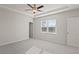 Bright bedroom with large window offering lots of natural light at 488 Village Ln, Fairburn, GA 30213