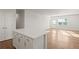 Open living space features hardwood floors and neutral walls at 488 Village Ln, Fairburn, GA 30213
