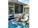 Relaxing screened back porch featuring stylish decor and a peaceful outdoor setting at 3809 Autumn View Nw Ln, Acworth, GA 30101