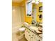 Well-lit bathroom featuring granite vanity, tub/shower combo, and stylish fixtures offering a spa-like experience at 3809 Autumn View Nw Ln, Acworth, GA 30101