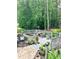 Back deck with seating and planters, perfect for outdoor relaxation at 3809 Autumn View Nw Ln, Acworth, GA 30101