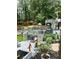 Multi-level deck featuring a charming water pump, a grill, and comfortable seating at 3809 Autumn View Nw Ln, Acworth, GA 30101