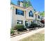 Inviting two-story home featuring black shutters, mature trees, and a well-manicured front yard at 3809 Autumn View Nw Ln, Acworth, GA 30101