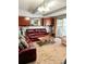 Comfortable living room with carpet floors, a stylish coffee table, and large windows allowing for plenty of natural light at 3809 Autumn View Nw Ln, Acworth, GA 30101