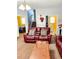 Comfortable living room with a reclining loveseat, wood-trimmed coffee table, and open access to other living spaces at 3809 Autumn View Nw Ln, Acworth, GA 30101