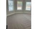 Bonus room with neutral walls, three windows, and wall-to-wall carpeting at 4015 Sierra Vista Cir, Cumming, GA 30040