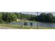 Sierra Lake neighborhood community pool, clubhouse, and lake at 4015 Sierra Vista Cir, Cumming, GA 30040