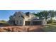 Side view of a brick home with an attached two car garage, situated on a sprawling lot with natural surroundings at 4015 Sierra Vista Cir, Cumming, GA 30040
