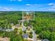 Aerial view highlights the community amenities including the park, enhancing the neighborhood appeal at 4572 Mulberry Fields Ln, Auburn, GA 30011