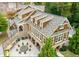 Overhead view of clubhouse boasts a large outdoor patio, complete with stone accents, BBQ, & seating for entertaining at 200 River Vista Dr # 436, Atlanta, GA 30339