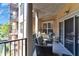 Spacious outdoor balcony with seating and views of the building exterior at 200 River Vista Dr # 436, Atlanta, GA 30339
