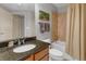 Bathroom with a vanity, granite countertop, and a shower-tub combo at 200 River Vista Dr # 436, Atlanta, GA 30339