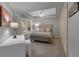 Bright bedroom features a tray ceiling, neutral colors and natural light at 200 River Vista Dr # 436, Atlanta, GA 30339