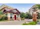 Property entrance has a guard house with brick accents and a gated entry to ensure resident privacy at 200 River Vista Dr # 436, Atlanta, GA 30339