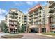 Upscale multi-story building features a water fountain, covered parking, and elegant architecture in a desirable location at 200 River Vista Dr # 436, Atlanta, GA 30339