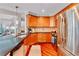 Modern kitchen with stainless steel appliances and granite countertops; open to living space at 200 River Vista Dr # 436, Atlanta, GA 30339