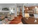 Open concept living area showcasing dining table, kitchen, and comfortable living room at 200 River Vista Dr # 436, Atlanta, GA 30339
