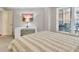 Bedroom with a modern workspace and a large window bringing in plenty of natural light at 200 River Vista Dr # 436, Atlanta, GA 30339