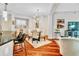 Open-concept living area with modern decor, hardwood floors and natural light at 200 River Vista Dr # 436, Atlanta, GA 30339