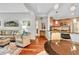 Spacious open-concept with combined kitchen and living area, featuring hardwood floors at 200 River Vista Dr # 436, Atlanta, GA 30339