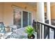 Relaxing outdoor patio space features comfortable seating and views from sliding glass doors to bring the outside in at 200 River Vista Dr # 436, Atlanta, GA 30339