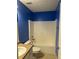 Bathroom features blue walls and a shower-tub combo at 3218 Watson Woods Way, Loganville, GA 30052