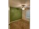 Bedroom showing a window, ceiling fan, and carpeted flooring at 3218 Watson Woods Way, Loganville, GA 30052