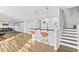 Basement area features a bar with seating and stairs to the main floor at 4325 Acanthite Ct, Cumming, GA 30040