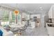 Spacious kitchen featuring a breakfast nook, stainless steel appliances, and light grey wood flooring at 4325 Acanthite Ct, Cumming, GA 30040