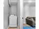 Cozy laundry area featuring a gray washing machine in a room with light gray walls at 4325 Acanthite Ct, Cumming, GA 30040
