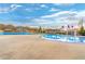 Resort-style pool area with a splash pad and seating, perfect for relaxation and recreation at 4325 Acanthite Ct, Cumming, GA 30040