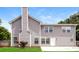 Expansive backyard with a lush green lawn and privacy fence, perfect for outdoor activities and relaxation, offering great potential at 194 Wilhelmina Dr, Austell, GA 30168