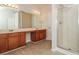 Bathroom featuring double sink vanity, shower and tile floor at 194 Wilhelmina Dr, Austell, GA 30168