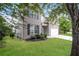 Charming brick home with a well-manicured lawn and lush landscaping at 194 Wilhelmina Dr, Austell, GA 30168