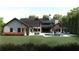 The backyard shows a stunning outdoor living space with a pool, patio, and lush landscaping at 250 Mayfield Rd, Alpharetta, GA 30009