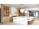 Features a spacious kitchen with marble counters, a large island, and modern cabinetry at 250 Mayfield Rd, Alpharetta, GA 30009
