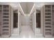 Spacious walk-in closet with custom shelving and mirrors at 250 Mayfield Rd, Alpharetta, GA 30009
