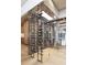 Modern wine cellar with glass enclosure, metal framing, and plenty of wine storage at 250 Mayfield Rd, Alpharetta, GA 30009